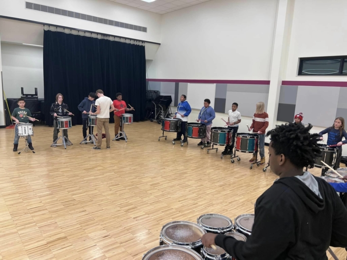 Black Star Drum League playing drums in the Madison Youth Arts center