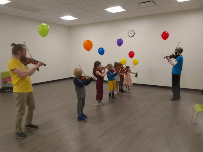 Kids playing music at the Madison Youth Arts center