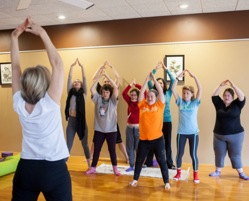 YAFA members practicing yoga