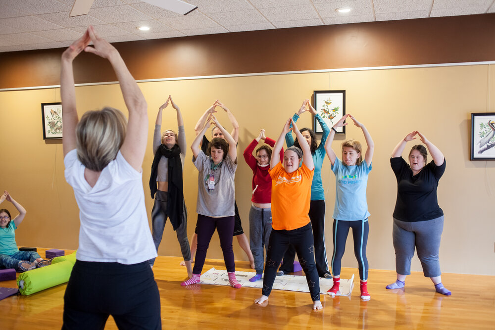 YAFA members practicing yoga